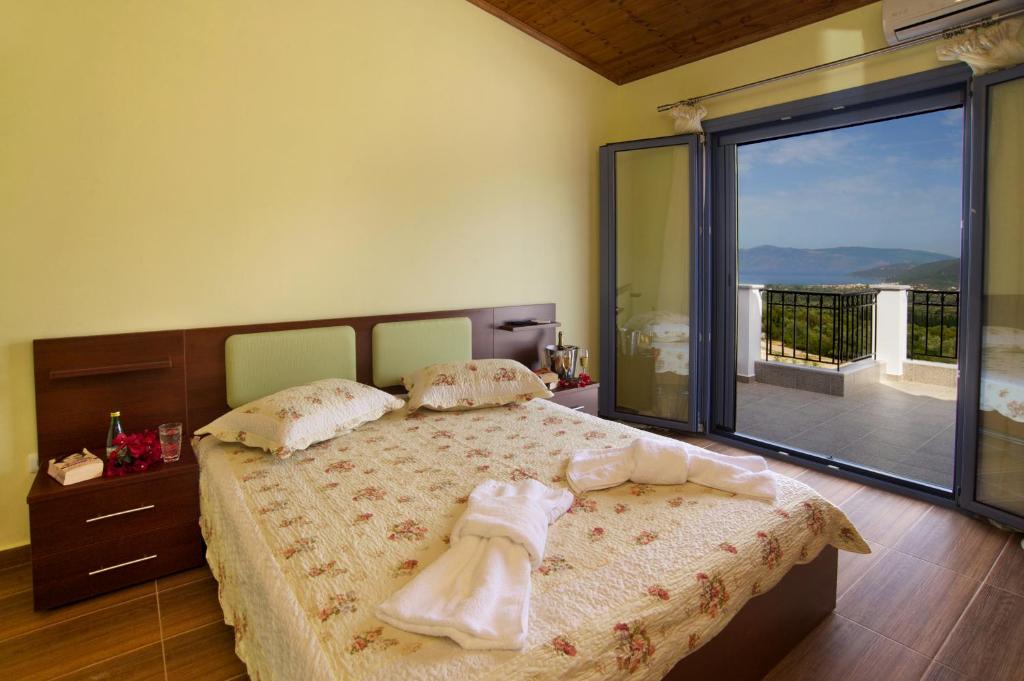 Postel nebo postele na pokoji v ubytování Sunrise Villa
