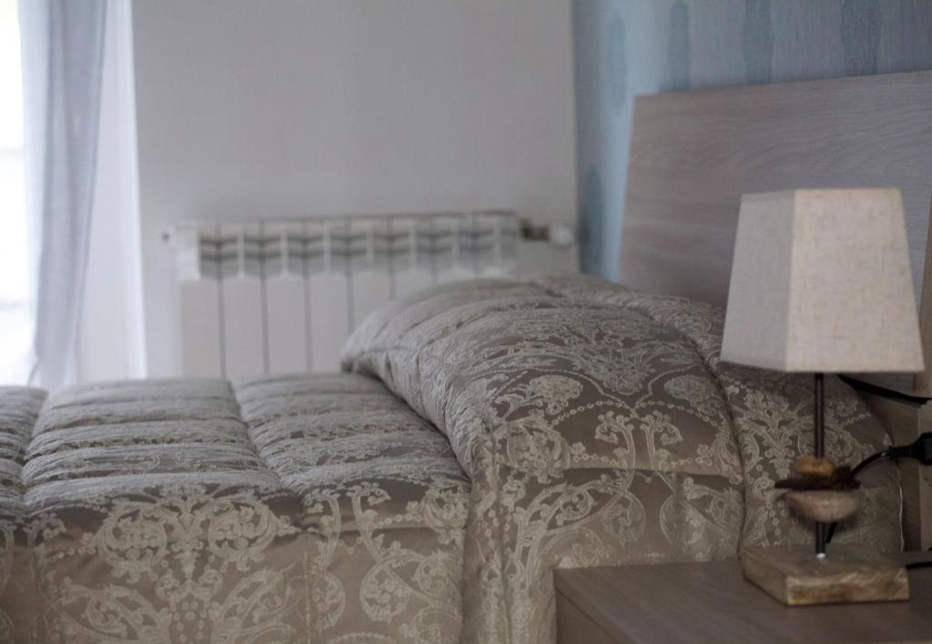 Postel nebo postele na pokoji v ubytování BITERVO