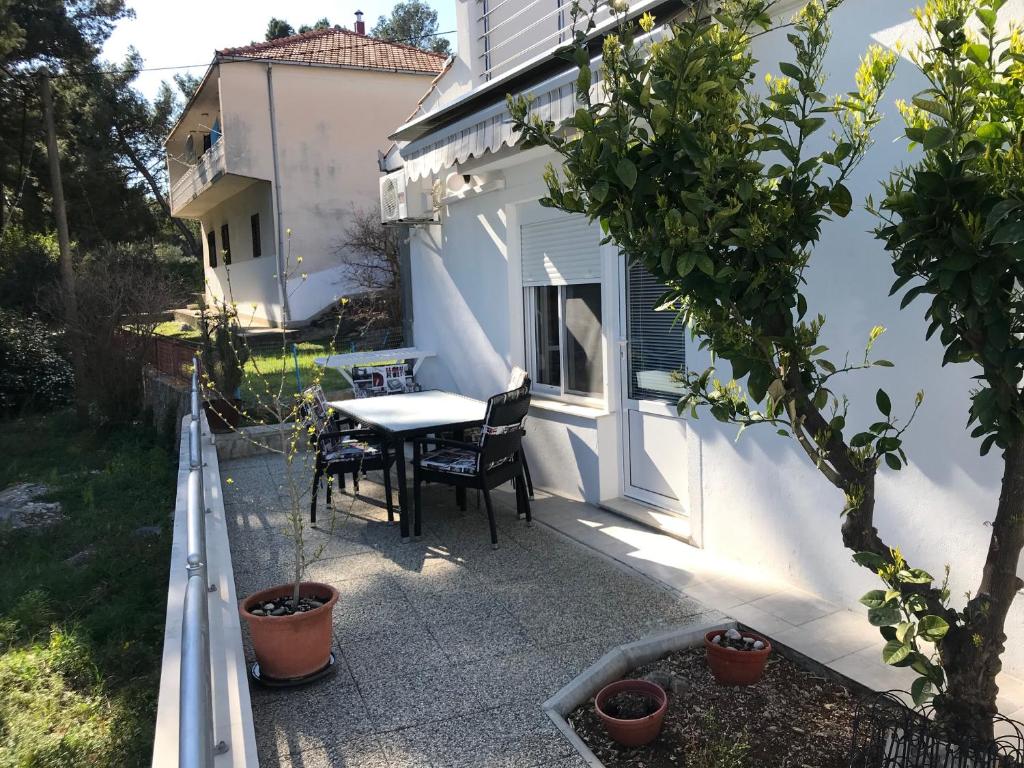 TONA APARTMENTS