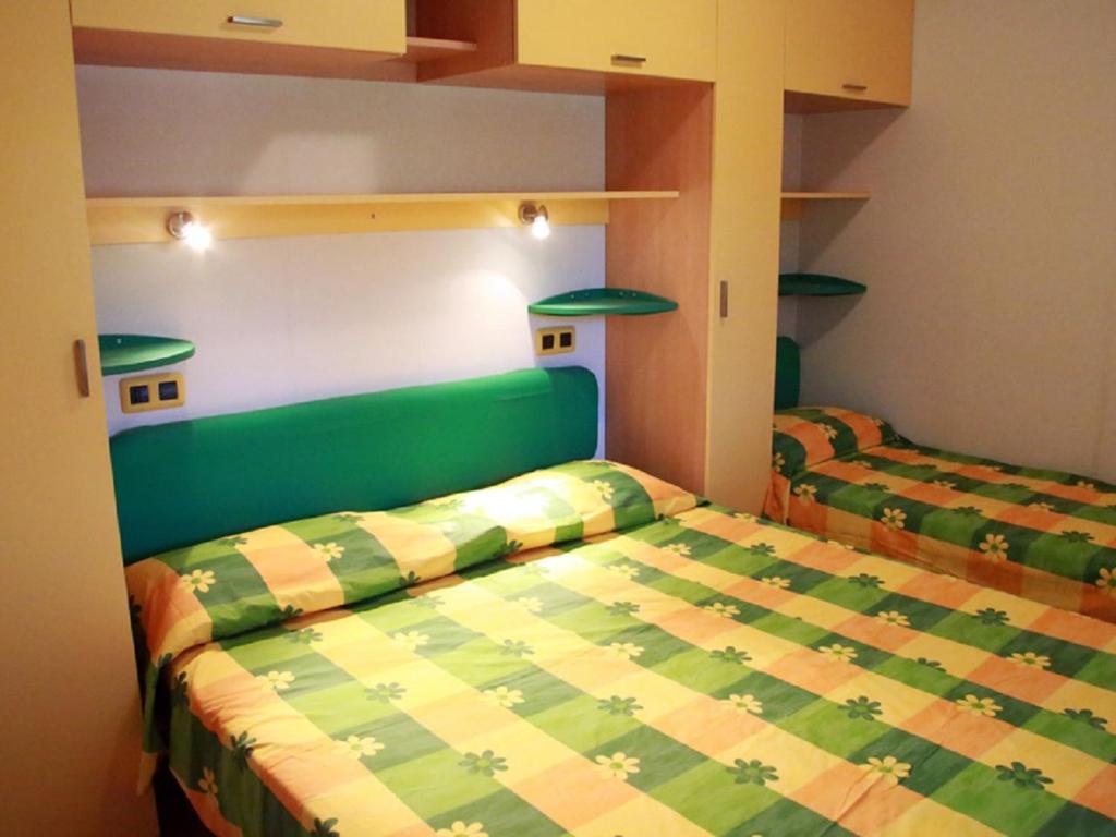 Postel nebo postele na pokoji v ubytování Camping Free Beach