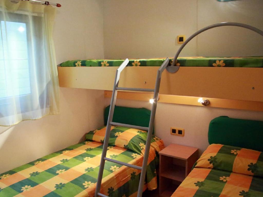 Postel nebo postele na pokoji v ubytování Camping Free Beach