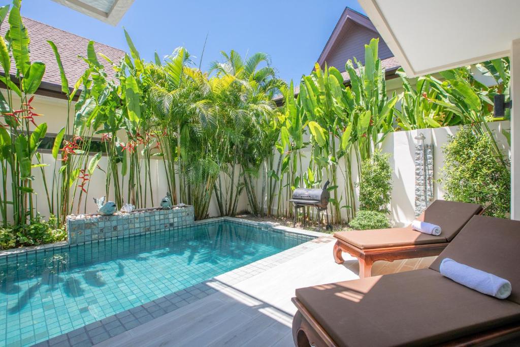 Bazén v ubytování Laem Ka Residence by Tropiclook nebo v jeho okolí