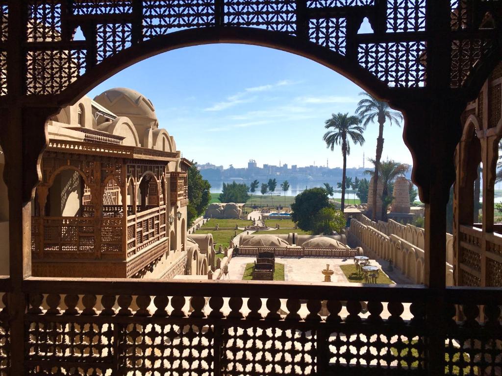 a view of the gardens from the palace at Djorff Palace in Luxor