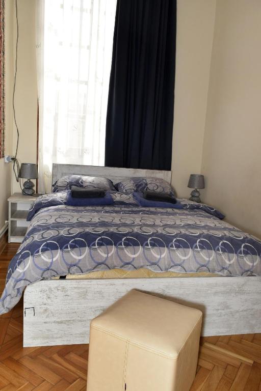 Postel nebo postele na pokoji v ubytování Le Petit