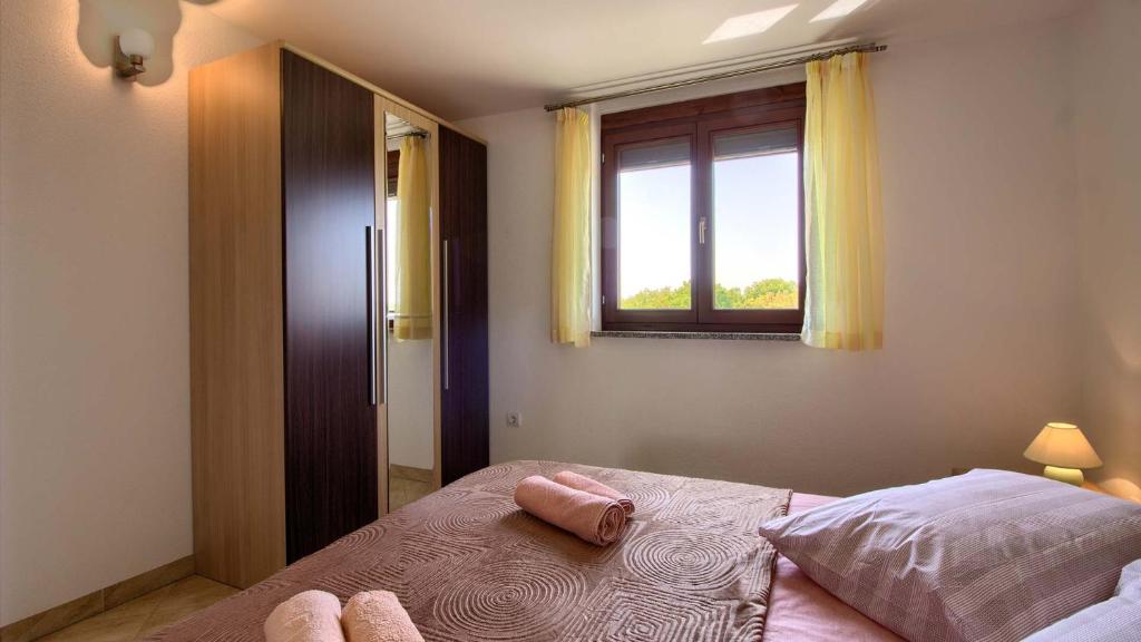 Posteľ alebo postele v izbe v ubytovaní Vila Mary with private pool in Medulin near the beach