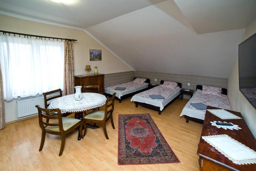 Postel nebo postele na pokoji v ubytování Willa Aida