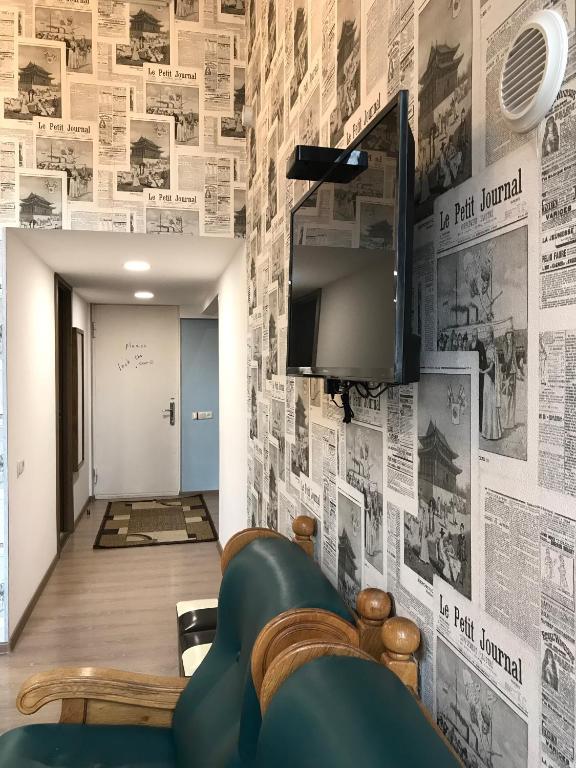 TV a/nebo společenská místnost v ubytování Le Petit