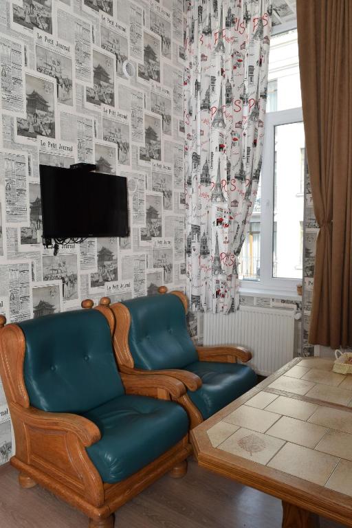 TV a/nebo společenská místnost v ubytování Le Petit