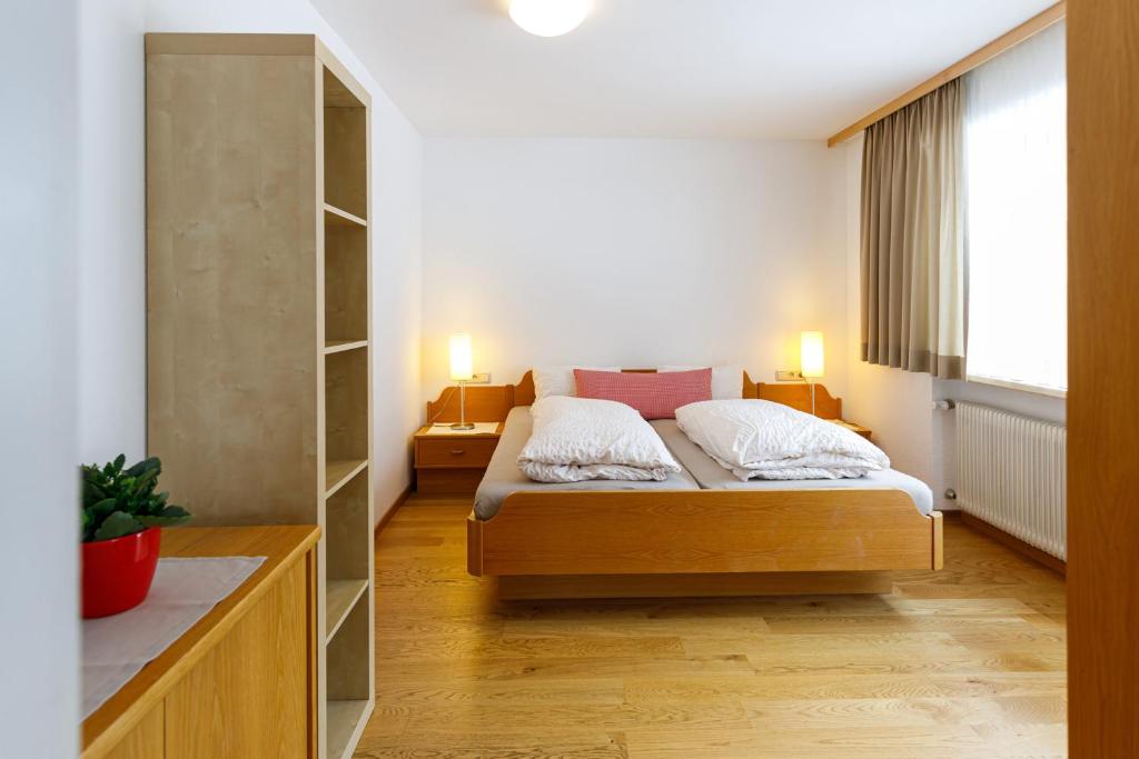 Postel nebo postele na pokoji v ubytování Haus Theresia