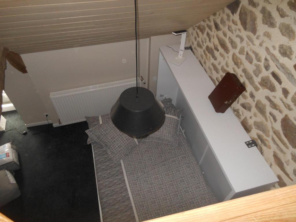 an overhead view of a room with a chandelier at Le Logis de Mordreuc in Pleudihen