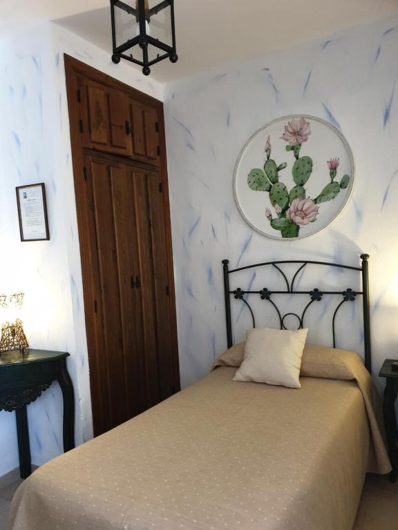 Cama o camas de una habitación en Hospedería El Caravansar