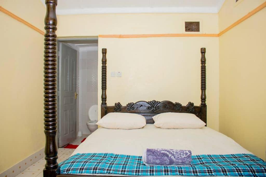 Postel nebo postele na pokoji v ubytování Ol marei Home