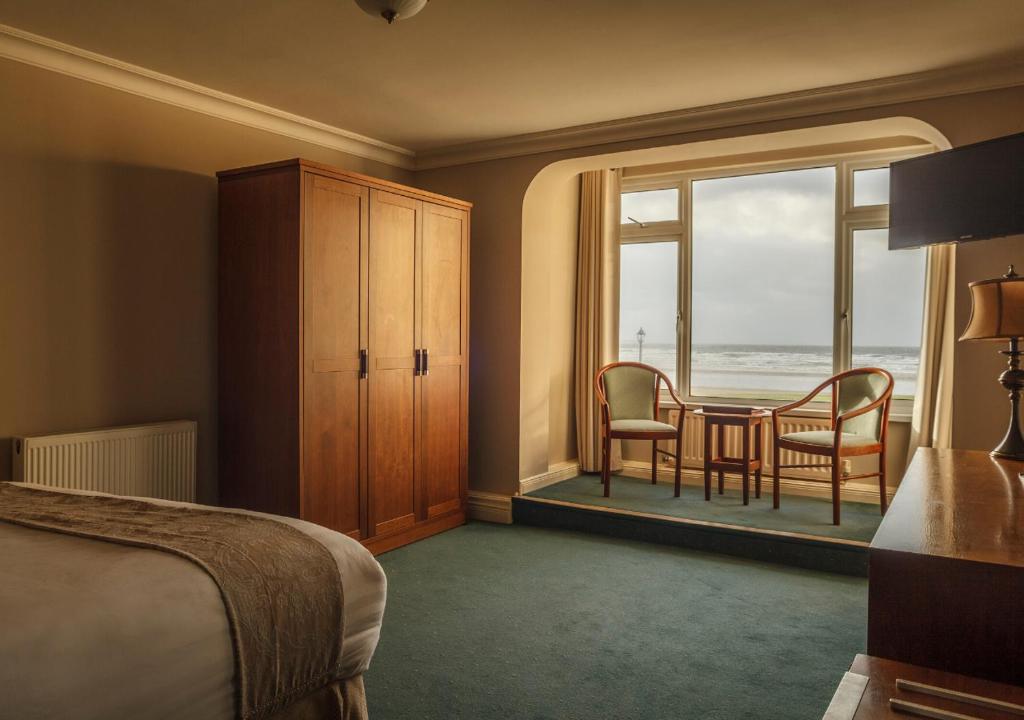 Postel nebo postele na pokoji v ubytování Sandhouse Hotel
