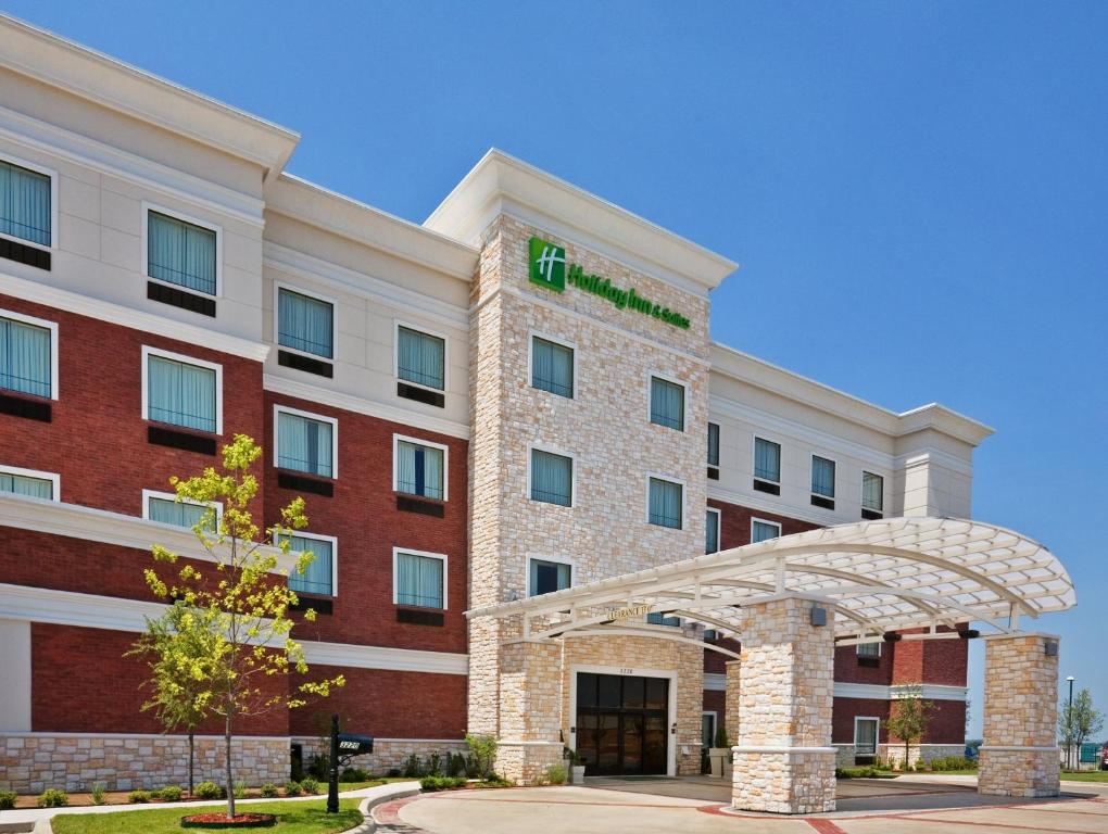 a rendering of the front of a hotel at Holiday Inn & Suites McKinney - N Allen, an IHG Hotel in McKinney