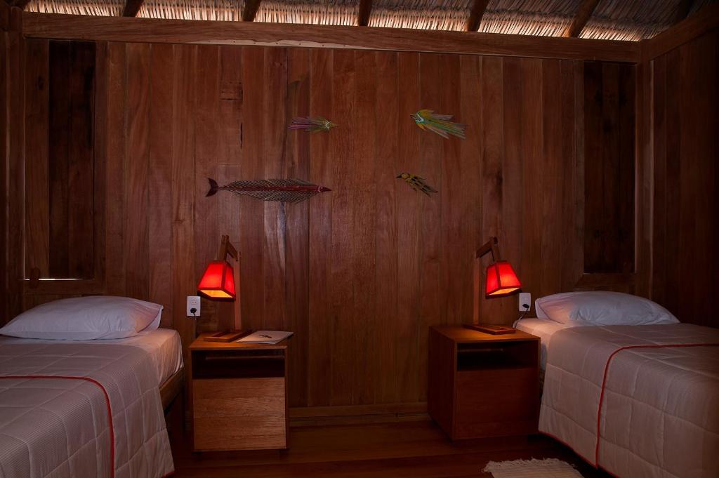 Cama ou camas em um quarto em Jaguaribe Lodge e Kite