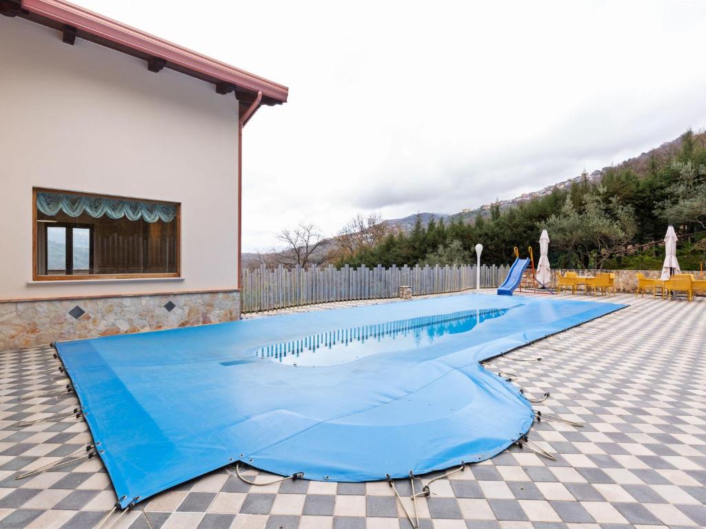 a swimming pool in a house with at Valley View Villa in San Mango D aquino with bubble bath in San Mango dʼAquino