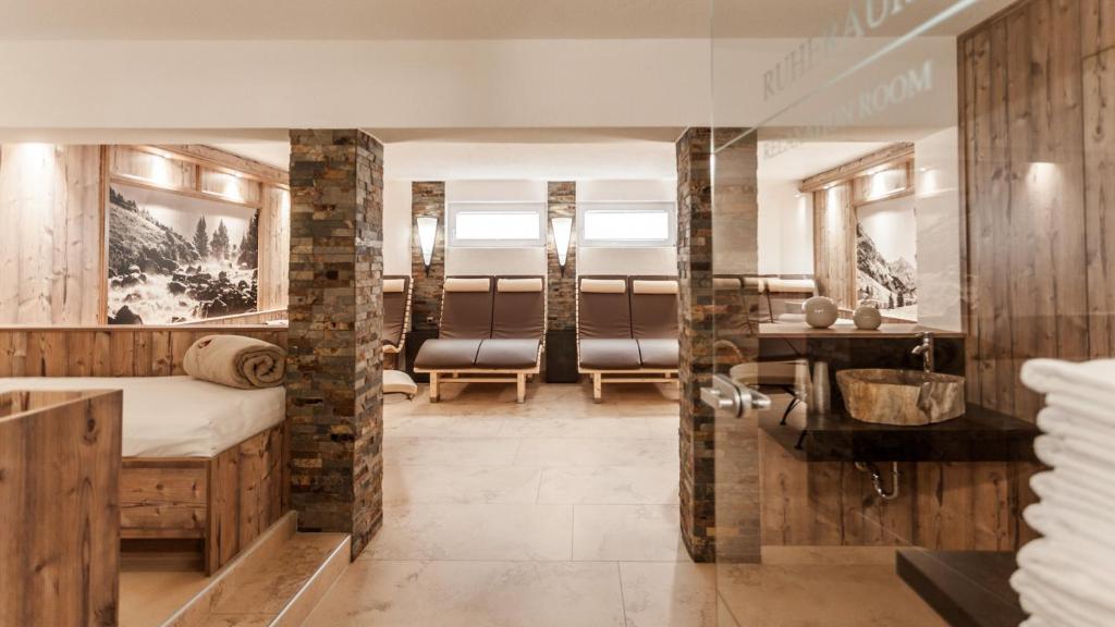 A bed or beds in a room at Panorama Appartements