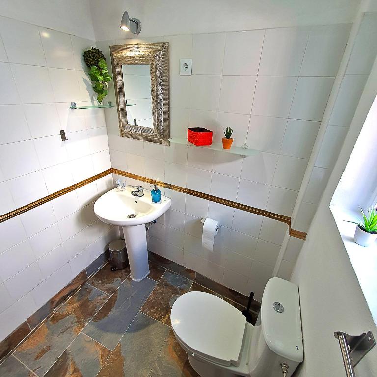 A bathroom at Milagros Central Apartments