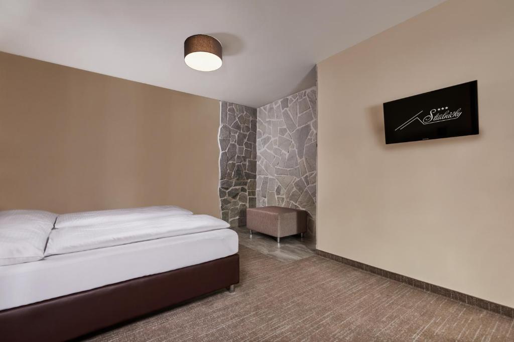 Postelja oz. postelje v sobi nastanitve Hotel Studničky