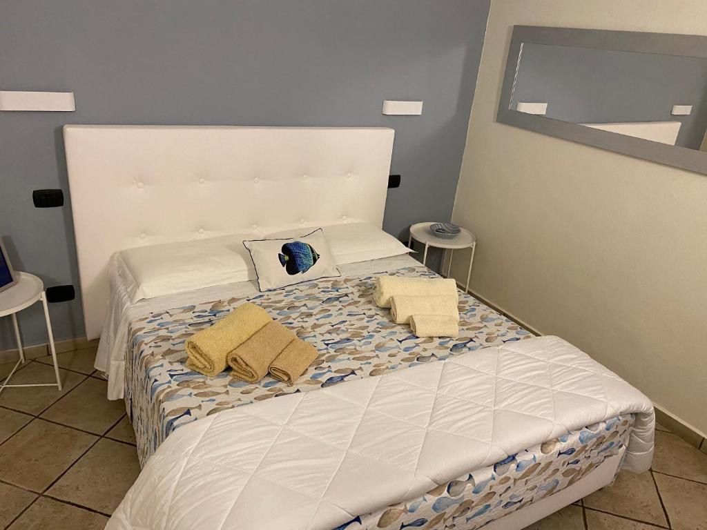 Posteľ alebo postele v izbe v ubytovaní B&B ALDA