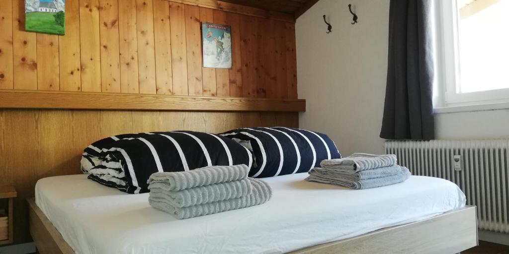 Postel nebo postele na pokoji v ubytování Haus Dienten Top 11