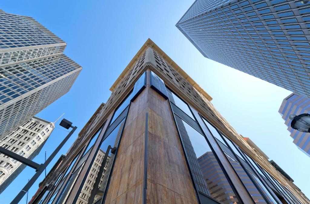 a tall building in the middle of two tall buildings at Candlewood Suites Baltimore - Inner Harbor, an IHG Hotel in Baltimore