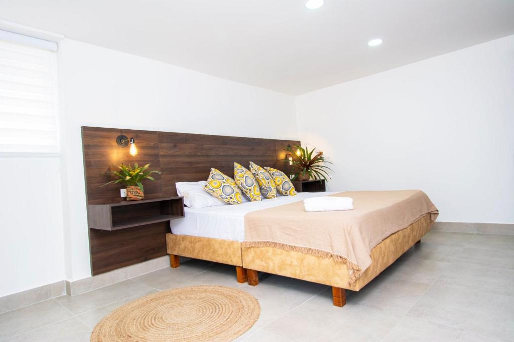 Postel nebo postele na pokoji v ubytování Hotel Viena