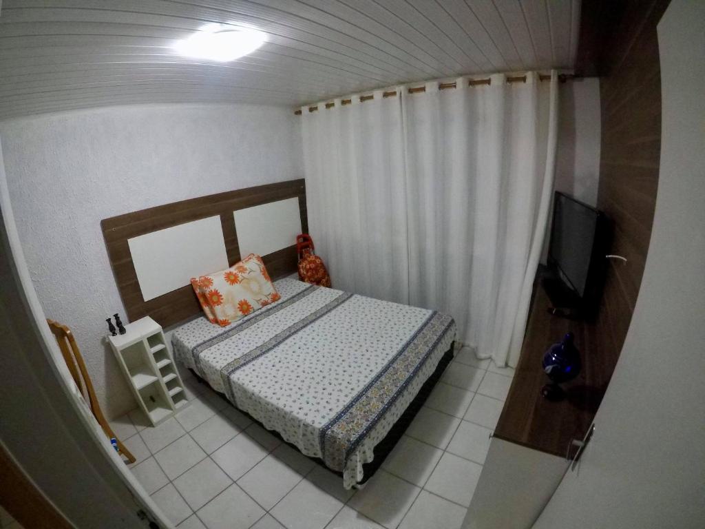 Casa em Torres as margens do rio com linda vista.