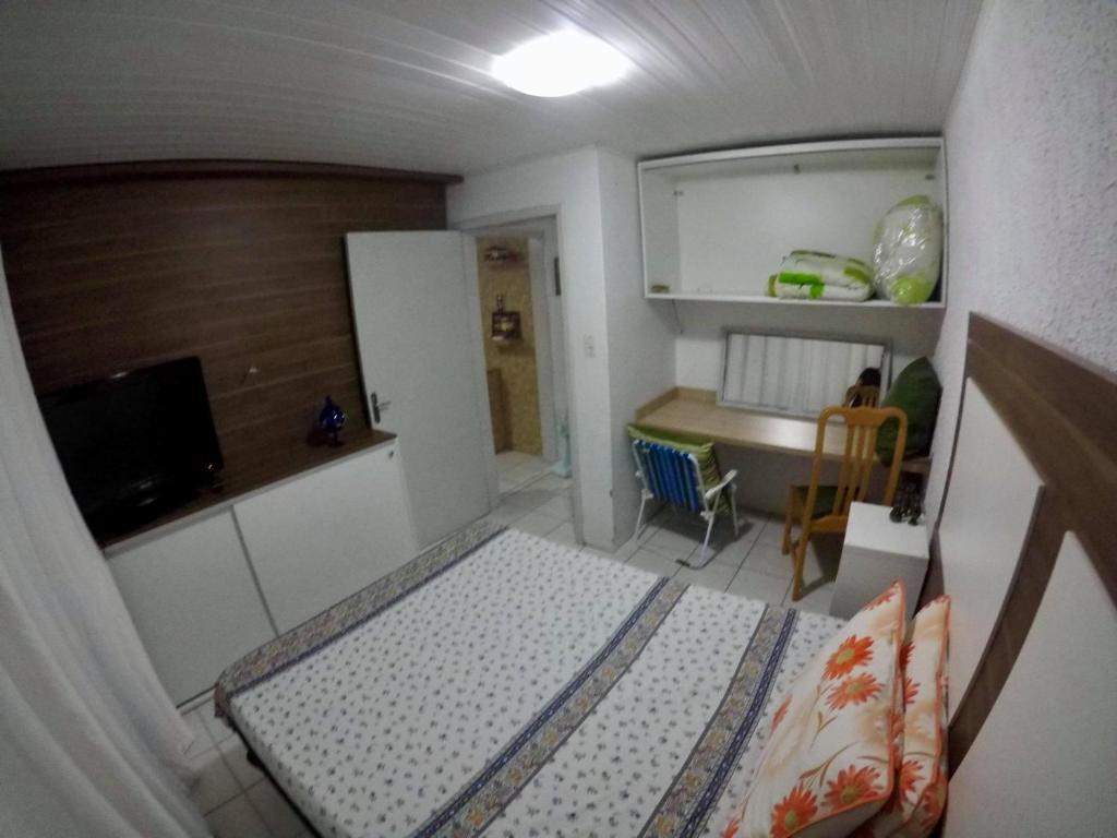  Casa em Torres as margens do rio com linda vista.