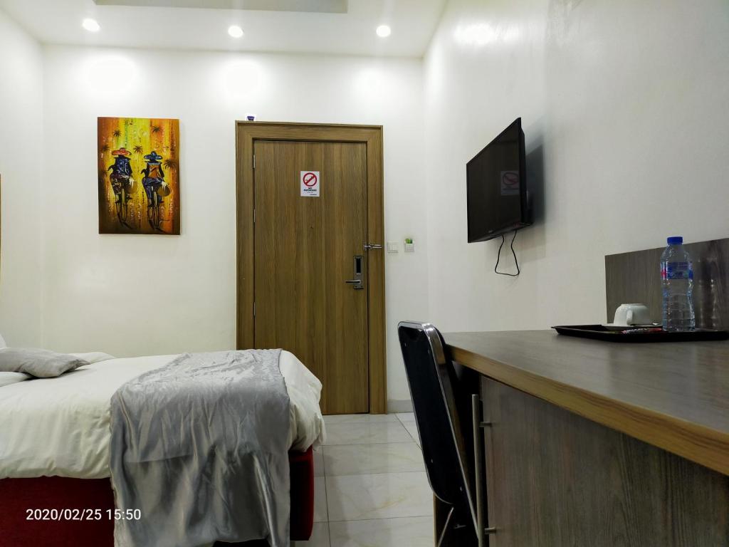 TV a/nebo společenská místnost v ubytování Dalchifit Suites by Premium Swiss Hospitality