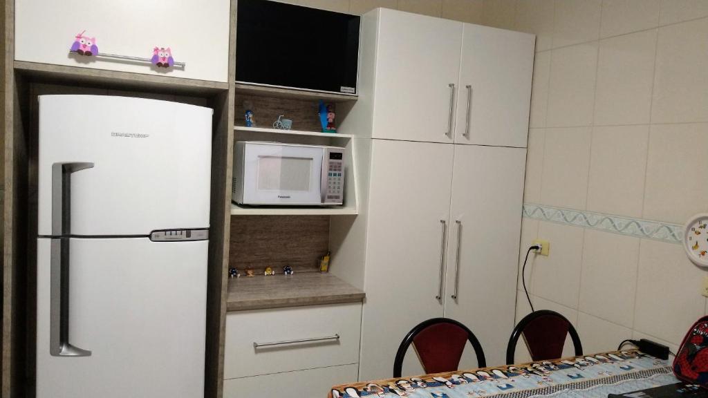  Casa Praia Grande - Guilhermina- 2 suítes com ar condicionado