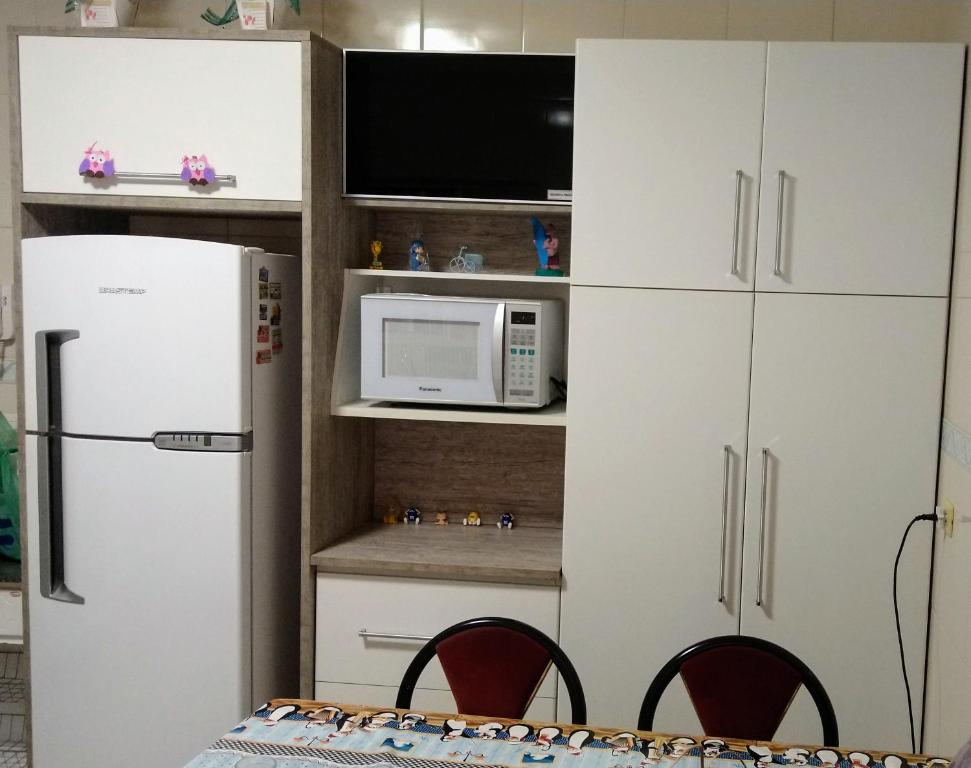  Casa Praia Grande - Guilhermina- 2 suítes com ar condicionado