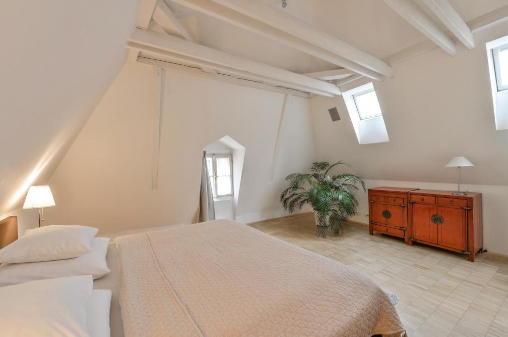 Łóżko lub łóżka w pokoju w obiekcie Eclectic Loft Royal Way