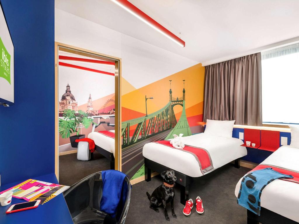 Postel nebo postele na pokoji v ubytování ibis Styles Budapest Citywest