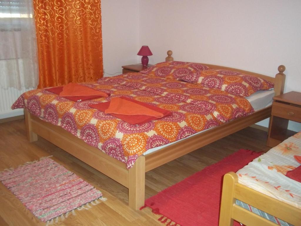 Postel nebo postele na pokoji v ubytování Rooms Žigić