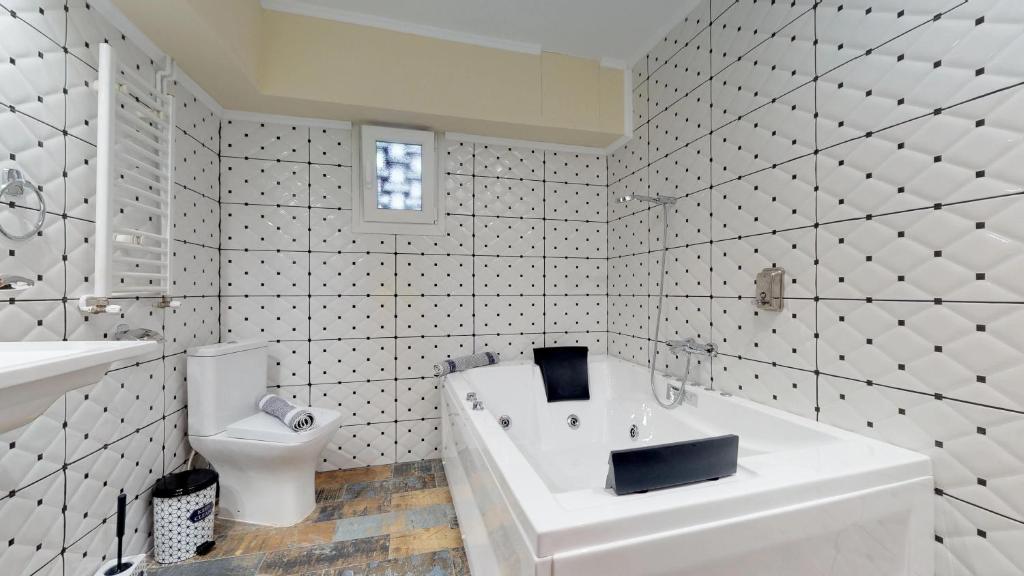 Kúpeľňa v ubytovaní Jacuzzi Suites