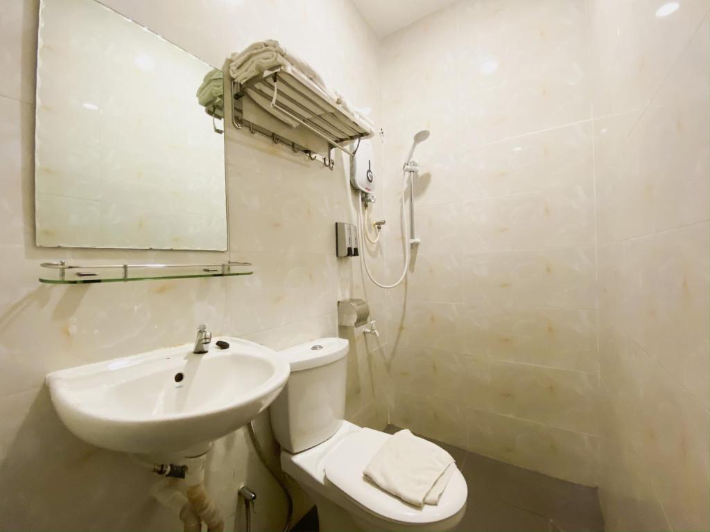 Koupelna v ubytování Carlsun Hotel