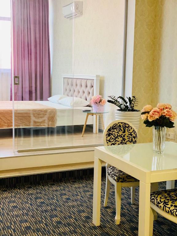 Postel nebo postele na pokoji v ubytování ArkPalmira