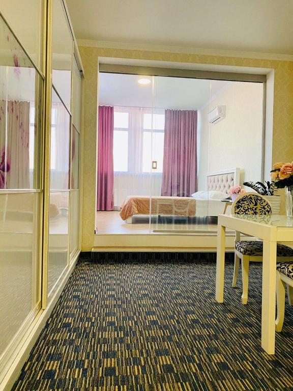 Postel nebo postele na pokoji v ubytování ArkPalmira