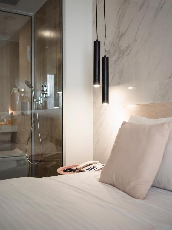 Kúpeľňa v ubytovaní Athena Hotel