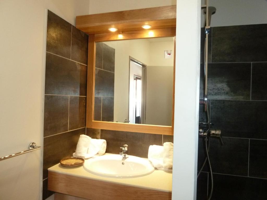 Koupelna v ubytování Tama Hotel