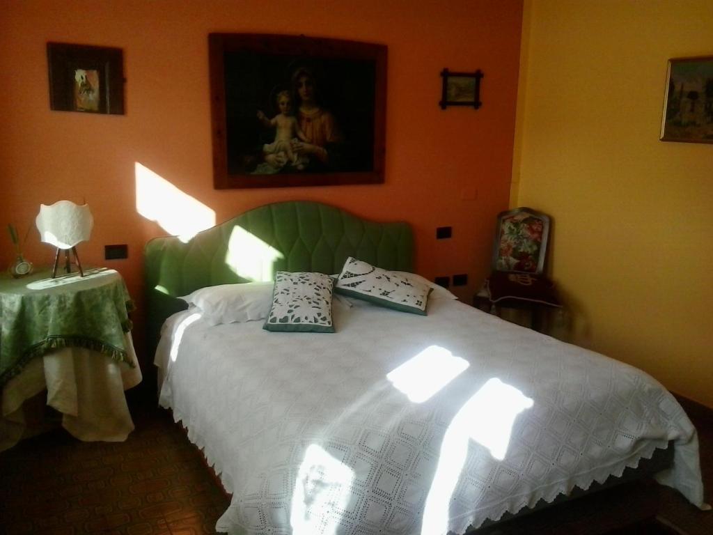Postel nebo postele na pokoji v ubytování Trattoria Milani