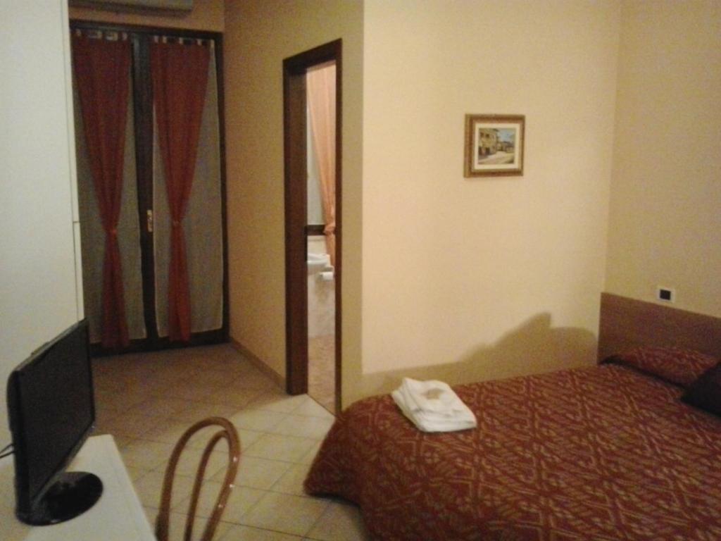 Postel nebo postele na pokoji v ubytování Trattoria Milani