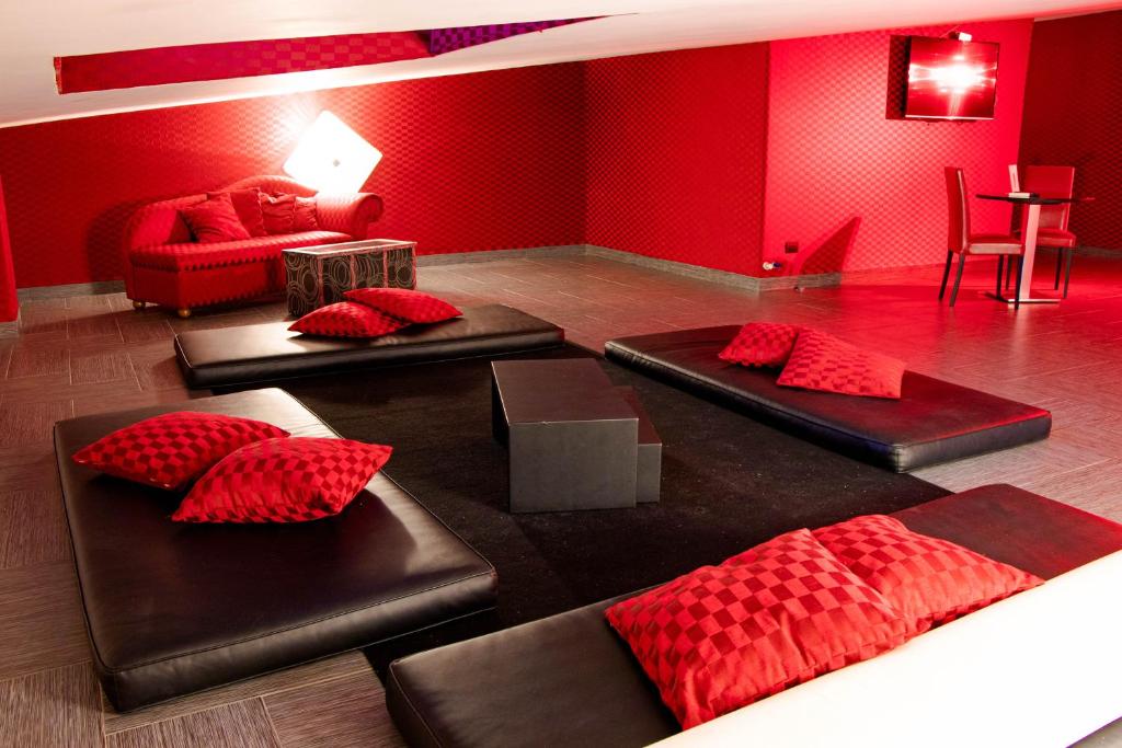 A seating area at Hotel Masaniello Luxury