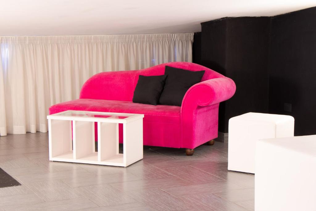 A seating area at Hotel Masaniello Luxury