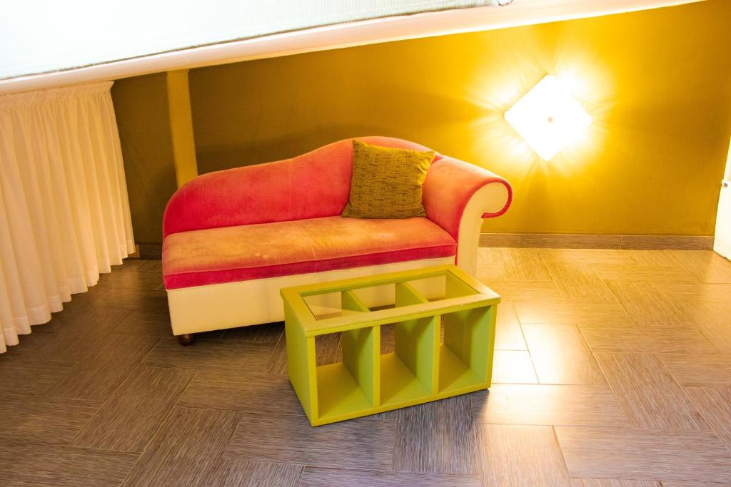 A seating area at Hotel Masaniello Luxury