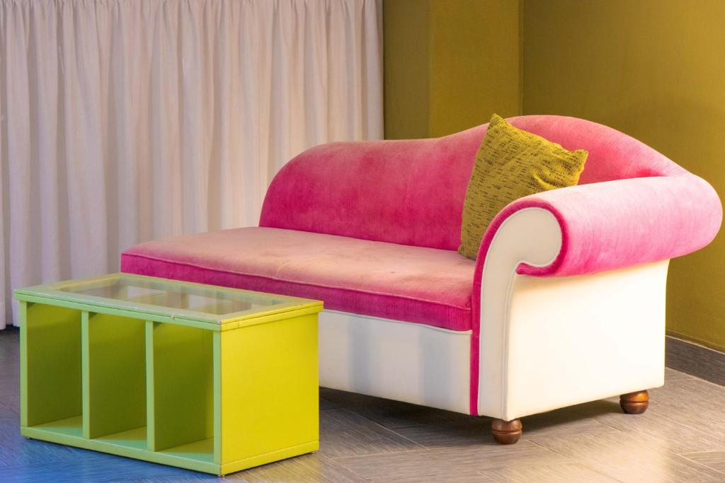 A seating area at Hotel Masaniello Luxury