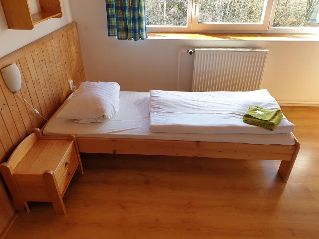 Postel nebo postele na pokoji v ubytování Penzion Kamzík