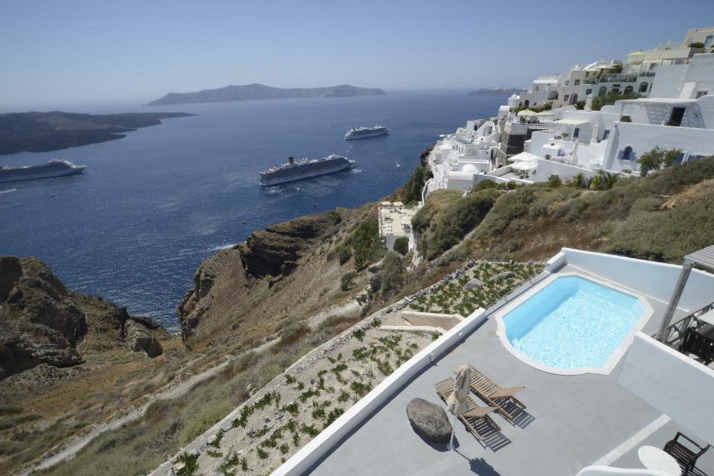 a view of the ocean from a villa at The Last Sunbeam - Adults Only in Fira