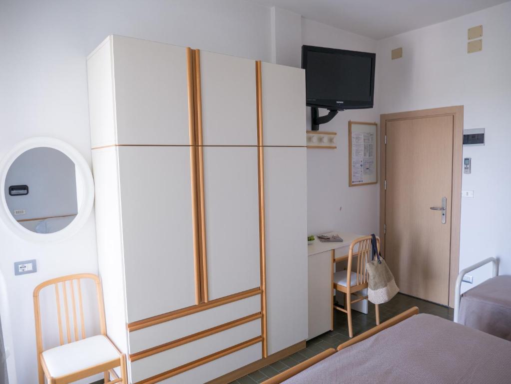 Postel nebo postele na pokoji v ubytování Hotel Pari